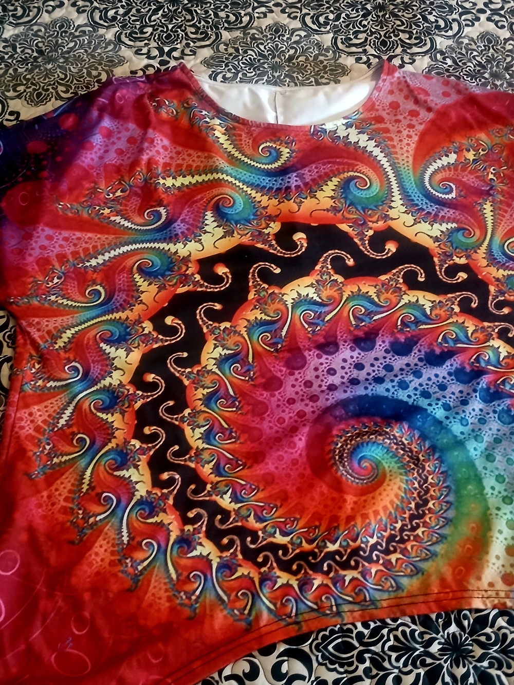 Vibrant Rainbow Spiral Graphic Top